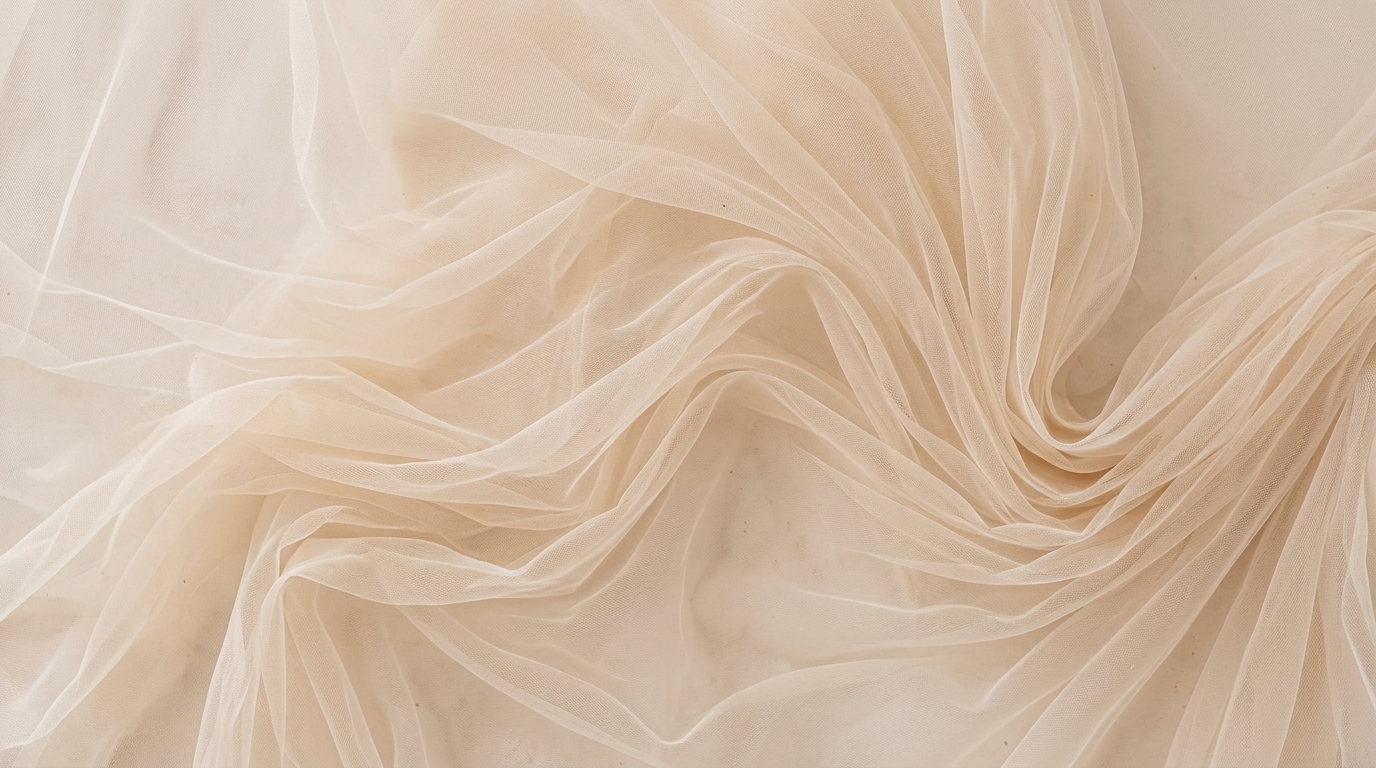 Flowing fabric texture in soft champagne tones